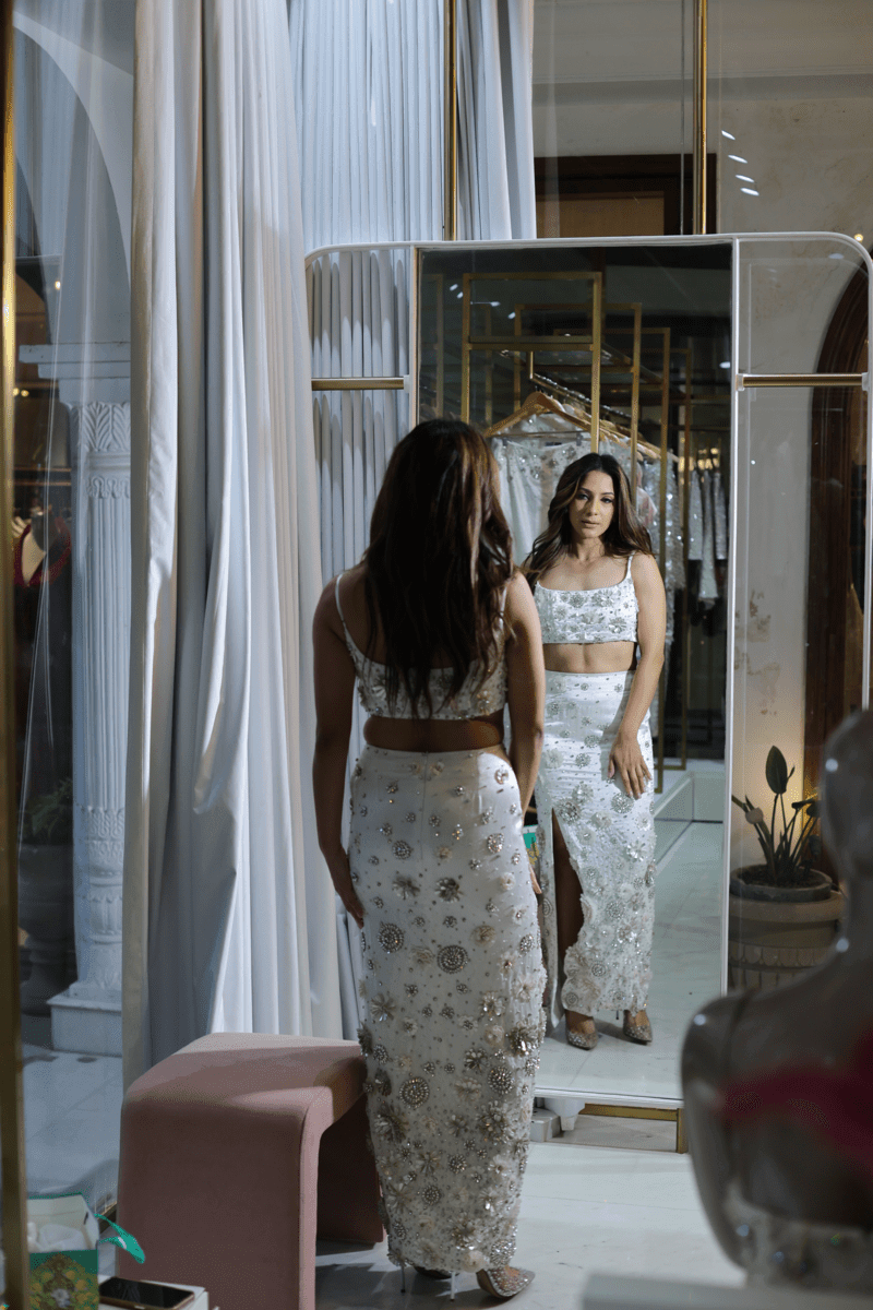 girl standing in front of mirror
